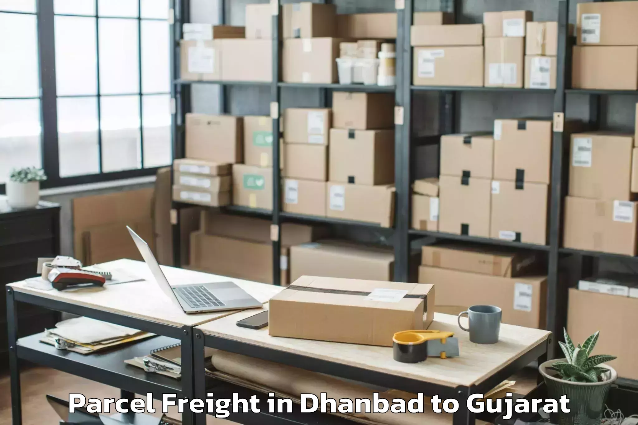 Trusted Dhanbad to Veer Narmad South Gujarat Univ Parcel Freight